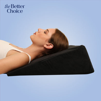 Wedge pillow displayed in use, offering elevation for acid reflux and snoring relief.